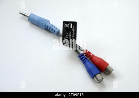 3.5 JACK CABLE TO JOIN AUDIO AND MICRO IN A SINGLE 3.5MM MINI CONNECTOR.  plug, contact, audio, connection, connect, bilateral connection, cables, com Stock Photo