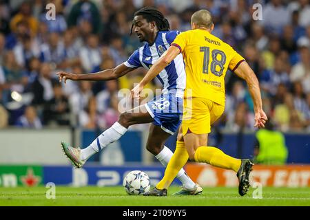 Romário Baró (Porto) and Oriol Romeu (Barcelona) in action during the UEFA Champions League Group H, Game 2, match between FC Porto and FC Barcelona Stock Photo