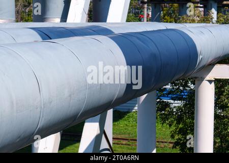 Ground-based heat pipes. The pipeline is above ground. Selective focus Stock Photo