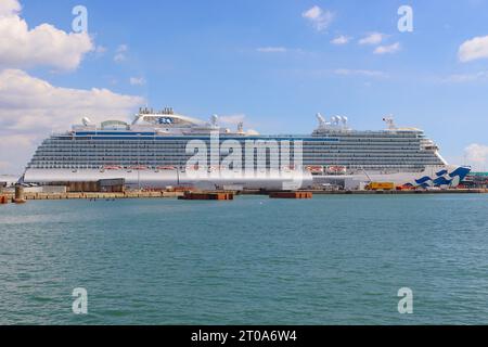 Enchanted Princess, a 145,000 ton Royal class cruise ship departing Southampton’s Ocean Dock with up to 5,800 passengers accommodated over 8 decks. Stock Photo