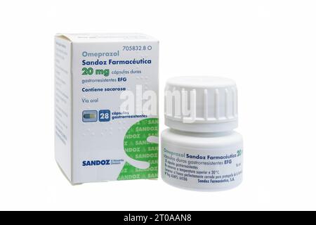 Huelva, Spain - September 25, 2023: Spanish bottle and box of Omeprazole, used to treat certain stomach and esophagus problems (such as acid reflux, u Stock Photo