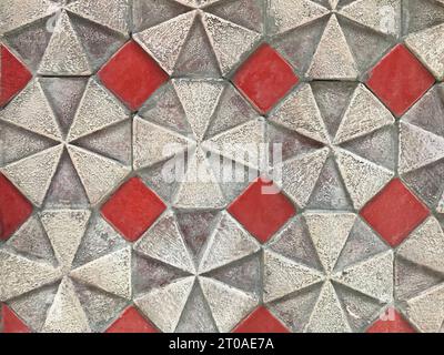 3D Textured ceramic tiles in umbrella pattern, crusader pattern, cross, red and white color, and modern geometric shapes. Stock Photo