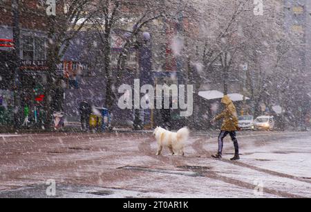 Snow falls in downtown Seattle across from Pike Place Market happens a couple times of year usually making the city quieter and a winter wonderland. Stock Photo