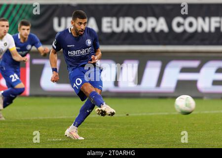 Gent, Belgium. 05th Oct, 2023. Gent's Tarik Tissoudali scores from penalty during a soccer game between Belgian soccer team KAA Gent and Israeli Maccabi Tel Aviv, Thursday 05 October 2023 in Gent, on day 2 of the group phase of the UEFA Conference League competition, in group B. BELGA PHOTO KURT DESPLENTER Credit: Belga News Agency/Alamy Live News Stock Photo