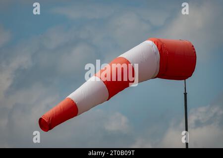 Speck-Fehraltorf, Zurich, Switzerland, July 2, 2023 Wind sock is waving in the wind at a small airfield Stock Photo