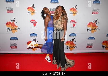 Munich, Germany. 05th Oct, 2023. Model Waris Dirie (l) and Mahima Klinge stand at the German premiere of the musical 'Desert Flower' at the Deutsches Theater. Credit: Felix Hörhager/dpa/Alamy Live News Stock Photo