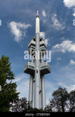 PRAGUE, CZECH REPUBLIC, EUROPE - Zizkov Television Tower, a 216m transmitter tower. On tower is sculptor David Cerny installation Babies. Stock Photo