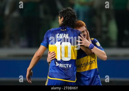 Edinson Cavani of Argentina's Boca Juniors heads the ball during a Copa  Libertadores quarterfinal second leg soccer match against Argentina's  Racing Club at Presidente Peron stadium in Buenos Aires, Argentina,  Wednesday, Aug.