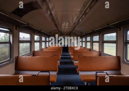 Picture of a typical seat from an old European train,, en route in Riga, Latvia, Europe, in a regional EMU train. Stock Photo