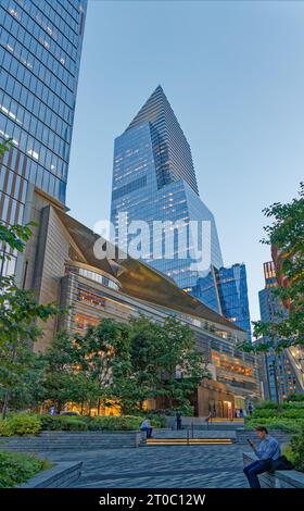 20 Hudson Yards, the shopping and dining hub linking 10 Hudson Yards (rear) with 30 Hudson Yards, is home to high-end retailers and restaurants. Stock Photo
