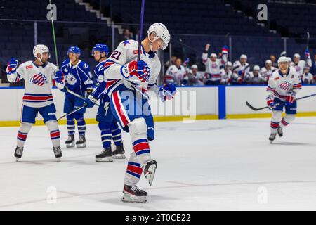 Rochester, New York, USA. 5th Oct, 2023. Rochester Americans forward Filip Cederqvist (21) celebrates a goal against the Syracuse Crunch. The Rochester Americans hosted the Syracuse Crunch in an American Hockey League preseason game at Blue Cross Arena in Rochester, New York. (Jonathan Tenca/CSM). Credit: csm/Alamy Live News Stock Photo