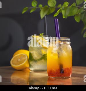 Healthy fruit and berry drinks. Summer cocktails in jar Stock Photo