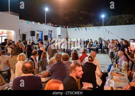 Ios, Greece - September 7, 2023 : 7, 2022 :  A traditional festival in Ios Greece where locals and tourists dancing and celebrating the Holy Mary Stock Photo