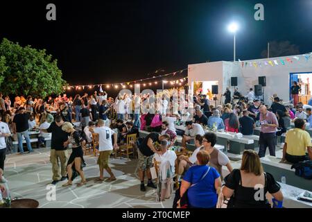 Ios, Greece - September 7, 2023 : 7, 2022 :  A traditional festival in Ios Greece where locals and tourists dancing and celebrating the Holy Mary Stock Photo