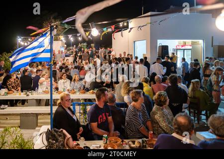 Ios, Greece - September 7, 2023 : 7, 2022 :  A traditional festival in Ios Greece where locals and tourists dancing and celebrating the Holy Mary Stock Photo