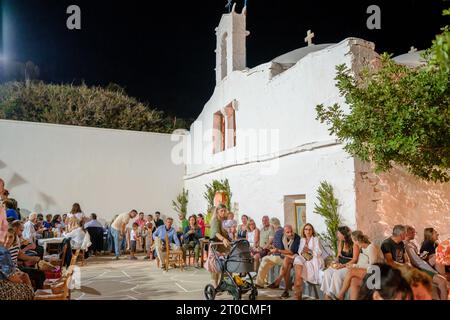 Ios, Greece - September 7, 2023 : 7, 2022 :  A traditional festival in Ios Greece where locals and tourists dancing and celebrating the Holy Mary Stock Photo