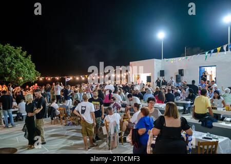 Ios, Greece - September 7, 2023 : 7, 2022 :  A traditional festival in Ios Greece where locals and tourists dancing and celebrating the Holy Mary Stock Photo