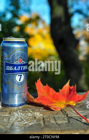 Breakfast picnic (Russian 'Baltika' lager) on a bench on High Castle Hill, Lviv, Ukraine, after an overnight train journey from Krakow. October 2012 Stock Photo