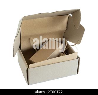 Open cardboard box. Packaging. Png file. Cardboard box with material inside. Stock Photo