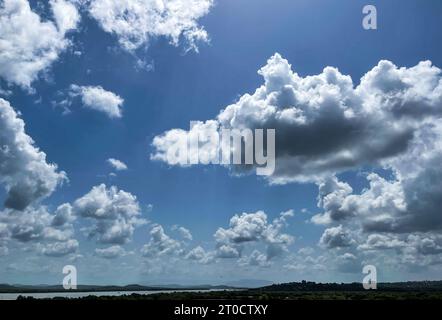 Clouds looks like cotton candy in the sky. Stock Photo