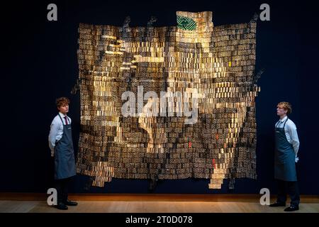 'Warrior' 2015 by El Anatsui (Estimate £700,000 - £1,000,000) at a photo call for Christie's 20th/21st Century: London Evening sale, on 13 October, the first in a series of sales dedicated to the scholarly vision of Sam Josefowitz. Picture date: Friday October 6, 2023. Stock Photo