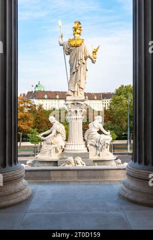 Pallas Athene statue in front of the Austrian houses of Parliament in Vienna, Austria, Europe. Symbolic for democracy and freedom. Stock Photo