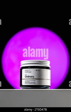 Strasbourg, France - September 2023: The Ordinary skincare brand by Deciem. Niacinamide Powder packaging against purple moon. Clean minimalist high ke Stock Photo