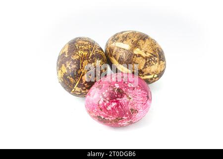 Three artistically painted easter eggs isolated on white. Stock Photo
