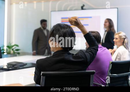 Business meeting with a successful moment. A group of diversity business people colleagues applause, clapping hands and hand closed fist show up for h Stock Photo