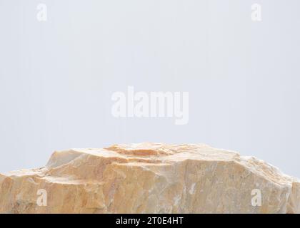 Stone podium isolate on white background with empty space.cosmetic beauty product present placement pedestal display,natural minimal stage concept. Stock Photo