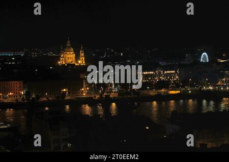 Night view of St Stephens Church in Budapest capital of Hungary and the reflections on the Danube River Stock Photo