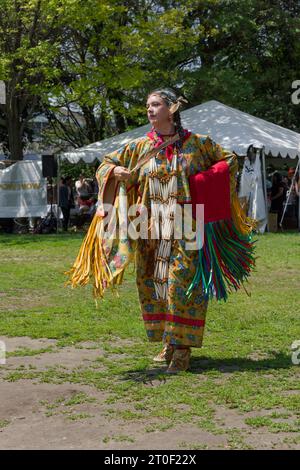 Traditional Pow Wow in recognition of Canada’s National Indigenous Peoples Day. day of dancing, drumming and performances. Woman dancing Stock Photo