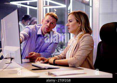 Analyst Working With Spreadsheet Business Data On Computer Stock Photo