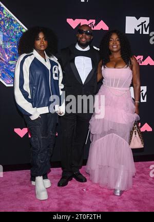 Angelina Claudinelle Jean, Wyclef Jean and Claudinette Jean attend the 2023 Video Music Awards at Prudential Center in Newark, NJ. Photo: Jeremy Smith Stock Photo