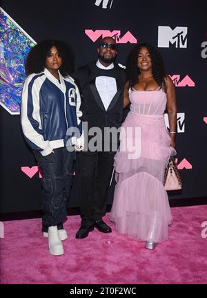 Angelina Claudinelle Jean, Wyclef Jean and Claudinette Jean attend the 2023 Video Music Awards at Prudential Center in Newark, NJ. Photo: Jeremy Smith Stock Photo