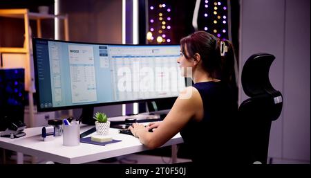 Account Manager In Office Coding Medical Spreadsheet Stock Photo