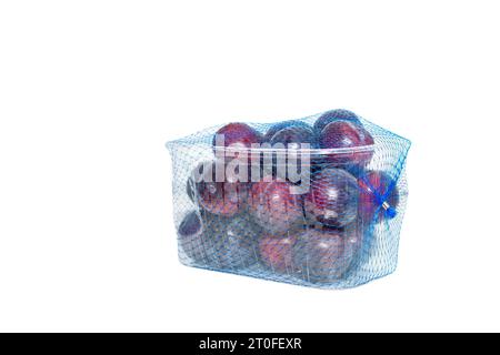 pack of plums isolated on white background Stock Photo