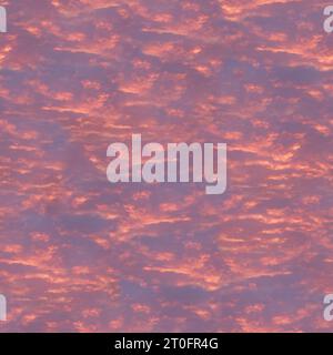 Beautiful sunset sky with orange clouds, illustration. Painting of yellow clouds on a bright summer day. Vector illustration of the summer skies. Seam Stock Photo
