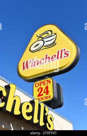 ORANGE , CALIFORNIA - 4 OCT 2023: Winchell Donuts sign in Jubilee Square on Tustin Sttreet. Stock Photo