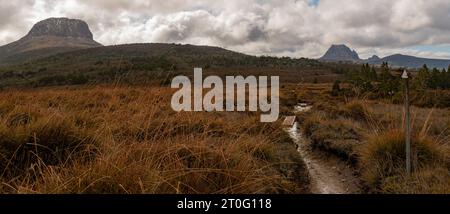 Landscape of Barns Bluff and Cradle Mountain Over Button Grass Plains Stock Photo