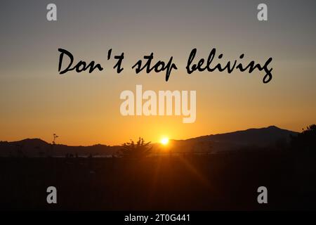Quote. Motivational and inspirational quotes - Don't stop believing. Stock Photo