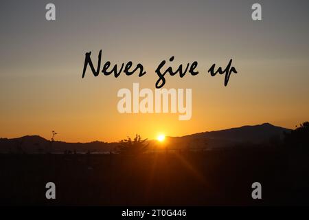 Quote. Motivational and inspirational quotes - Never give up. Stock Photo