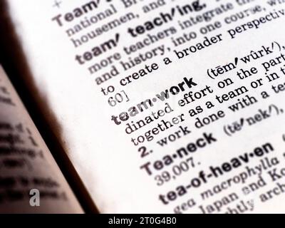 Closeup definition of the word teamwork in the dictionary Stock Photo