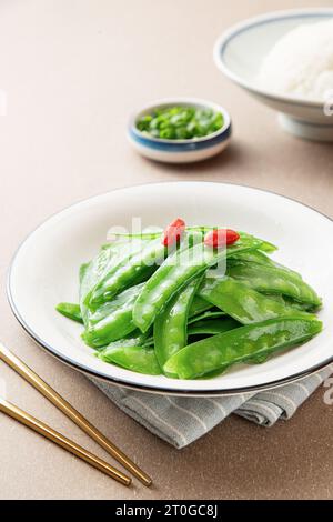 Sautéed (Stir Fried) snow peas Stock Photo