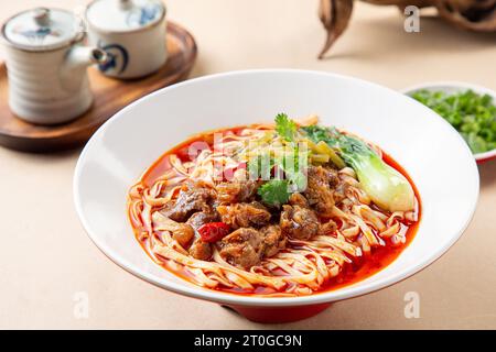 A bowl of Pork Intestines Noodles Stock Photo