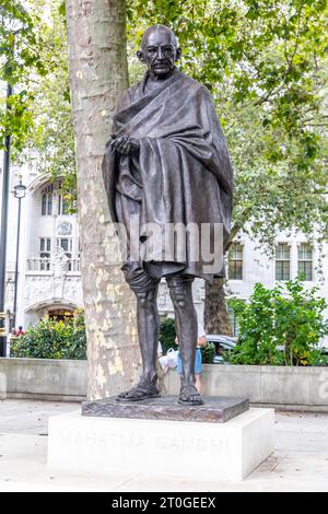 Mahatma Gandhi statue of the Indian lawyer and leader of India's independence from Great Britain,Parliament Square London England,UK Stock Photo