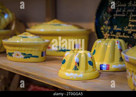 Strasbourg, France - May 31, 2023: Traditional ceramic cake molds for Alsatian kugelhopf or gugelhupf at a souvenir shop in the historic center Stock Photo