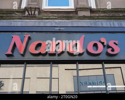 DUNDEE, UK - SEPTEMBER 12, 2023: Nando's restaurant sign Stock Photo