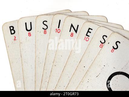 Vintage Lexicon playing cards spelling the word BUSINESS on a white background. Stock Photo