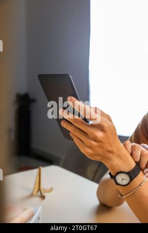 Reading E-book with Amazon paperwhite 3 Kindle stock photo Stock Photo